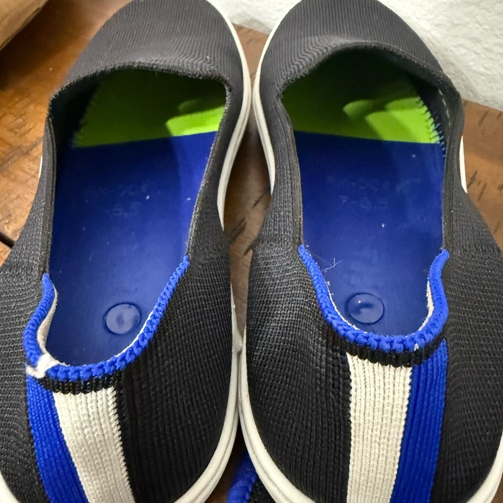 Rothy's The Original Slip On Sneaker in black solid with blue trim - Picture 8 of 8